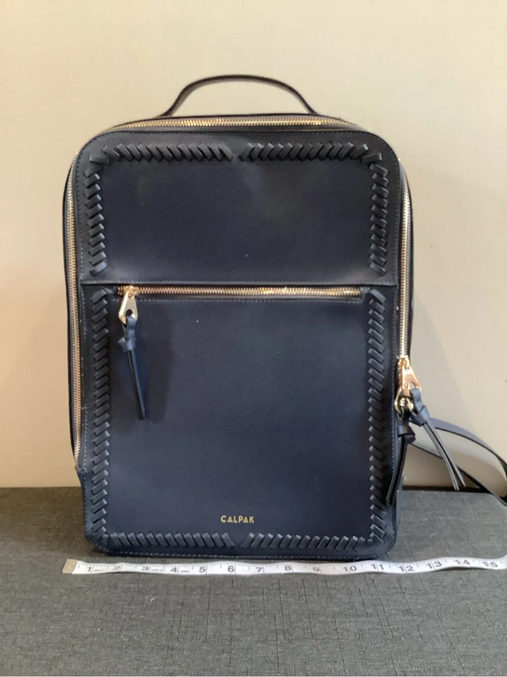 Calpak Navy Leather Backpack with Whipstitch Trim